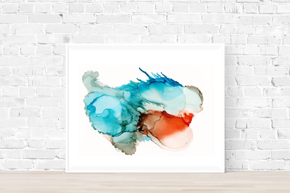 blue and orange art print in frame